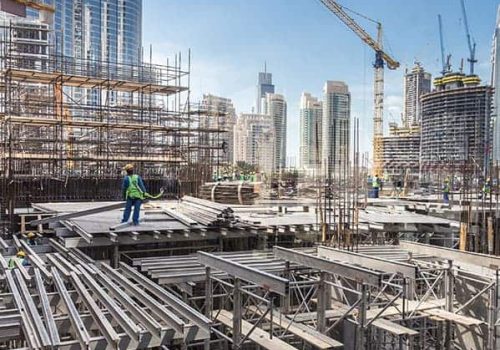Pre-Insulated Pipes being installed on a high-rise construction building