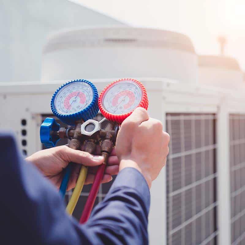 Worker using pressure measuring device